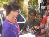 Volunteer- Aartee Srivasthava received by the children.jpg